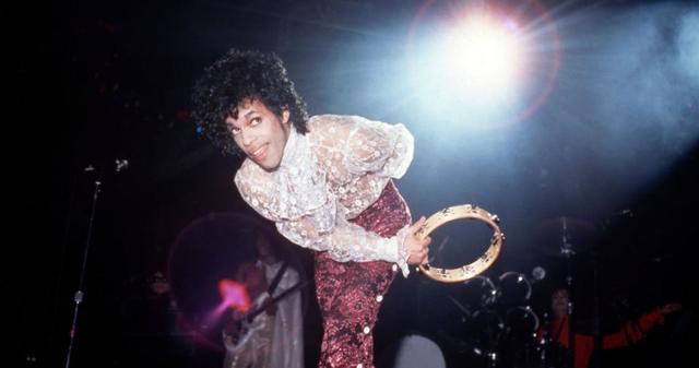 Prince performs onstage during the 1984 Purple Rain Tour on November 4, 1984, at the Joe Louis Arena in Detroit, Michigan. (Photo by Ross Marino/Getty Images)