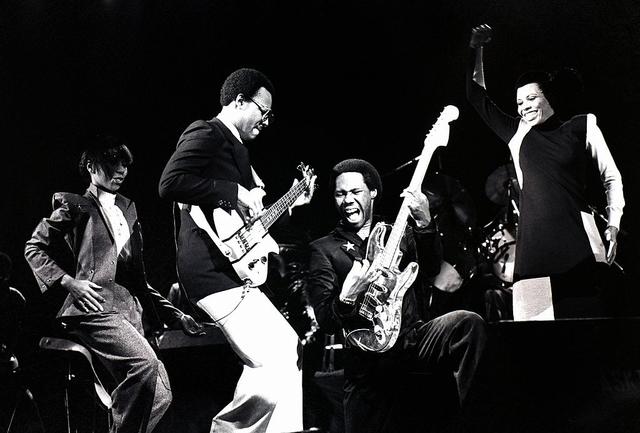 Chic perform on stage in London, October 1979. Left to right: Luci Martin, Bernard Edwards, Nile Rodgers and Alfa Anderson. (Photo by Gus Stewart/Redferns)