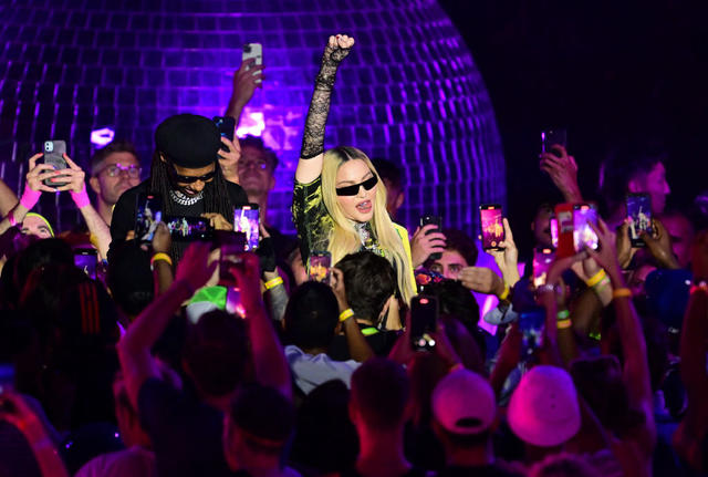 NEW YORK, NEW YORK - AUGUST 10: Nile Rodgers and Madonna speak to a crowd at The DiscOasis in Central Park on August 10, 2022 in New York City. (Photo by James Devaney/GC Images)