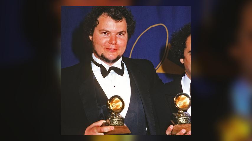 American musician Christopher Cross poses with a Grammy Award (one of several for his song 'Sailing'), New York, New York, February 25, 1981. (Photo by Allan Tannenbaum/Getty Images)