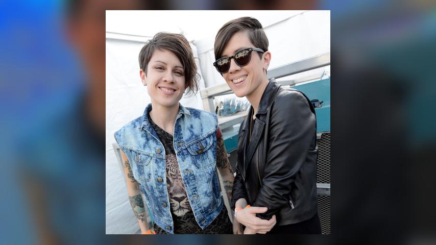 INDIO, CA - APRIL 12: Tegan Quin (L) and Sara Quin of Tegan and Sara pose at the 2013 Coachella Valley Music & Arts Festival at the Empire Polo Field on April 12, 2013 in Indio, California. (Photo by Tim Mosenfelder/WireImage)
