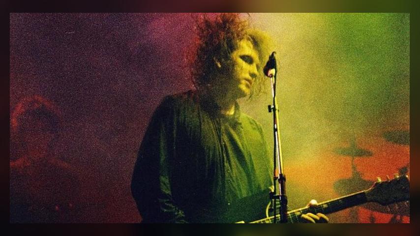 LONDON, UNITED KINGDOM - JULY 23: Robert Smith of The Cure performs on stage at Wembley Arena, on July 23rd, 1989 in London, United Kingdom. (Photo by Pete Still/Redferns)