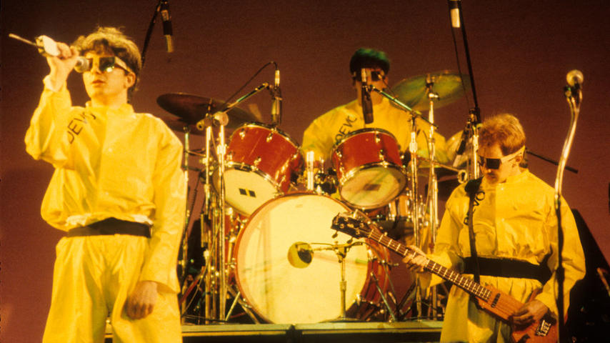 SAN FRANCISCO, UNITED STATES - JUNE 29: (L-R) Mark Mothersbaugh, Alan Meyers and Gerald Casale of Devo performing at the Warfield Theater in San Francisco on June 29, 1979. (Photo by Clayton Call/Redferns)