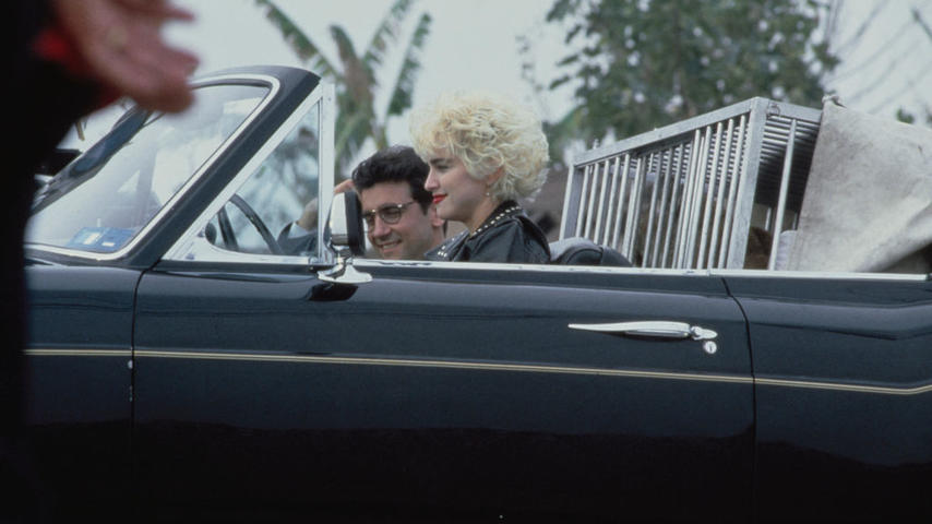 American singer and actress Madonna and her co-star Griffin Dunne on the set of the film 'Slammer', later titled 'Who's That Girl?', USA, circa 1987. (Photo by Vinnie Zuffante/Michael Ochs Archives/Getty Images)