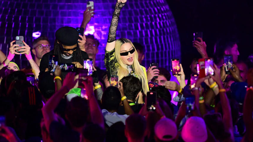 NEW YORK, NEW YORK - AUGUST 10: Nile Rodgers and Madonna speak to a crowd at The DiscOasis in Central Park on August 10, 2022 in New York City. (Photo by James Devaney/GC Images)